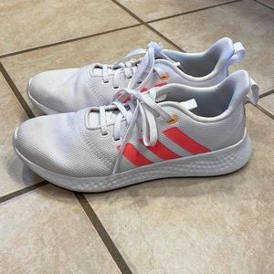 Adidas shoes in white with fluorescent pink stripes. Size 10.